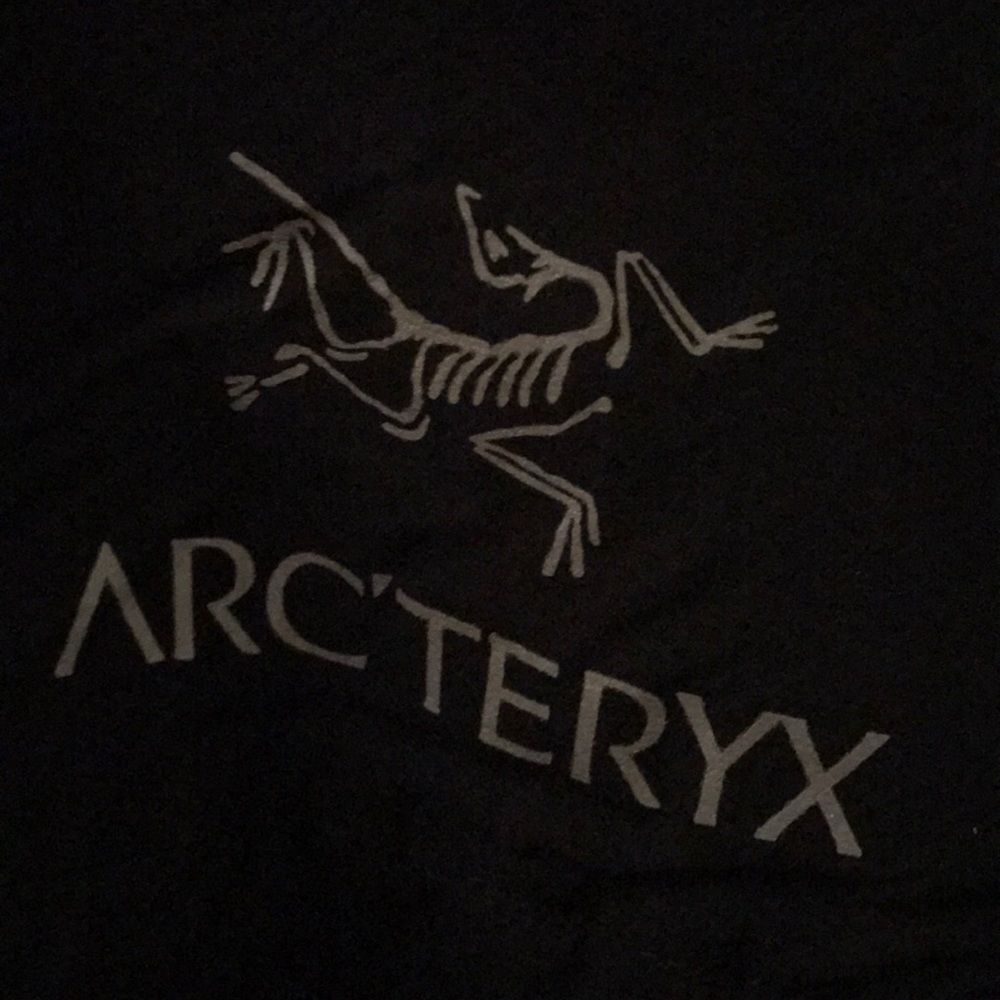 Lightweight Arcteryx insulated zip up jacket